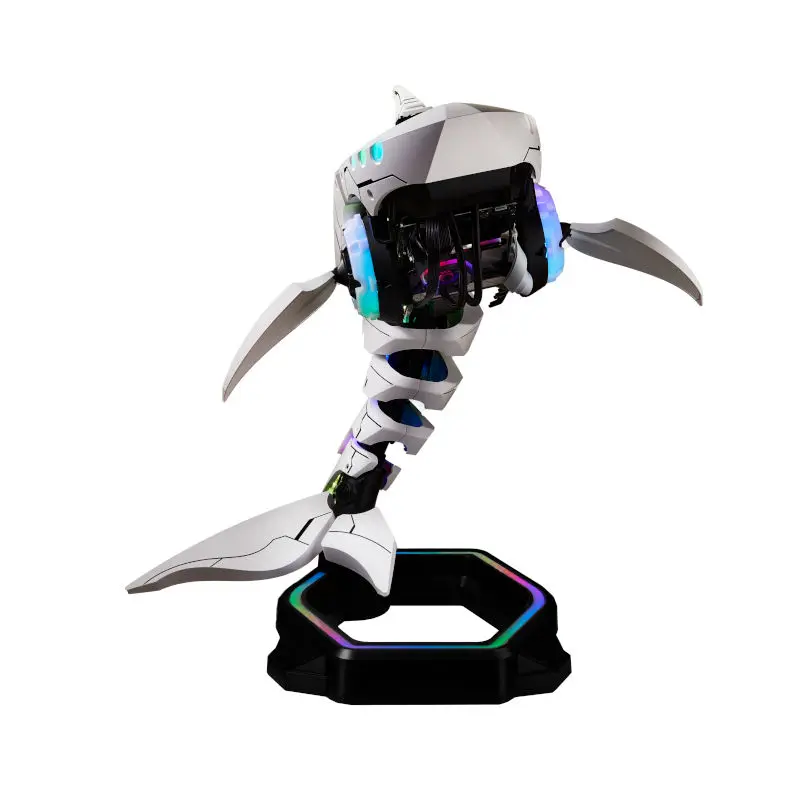 Cooler-Master-SHARK-X-Cabinet-With-PSU-and-CPU-Cooler-Included-White-2 | PC Studio White robotic dragon on a black display base with rainbow RGB lights and extending blades on its sides.