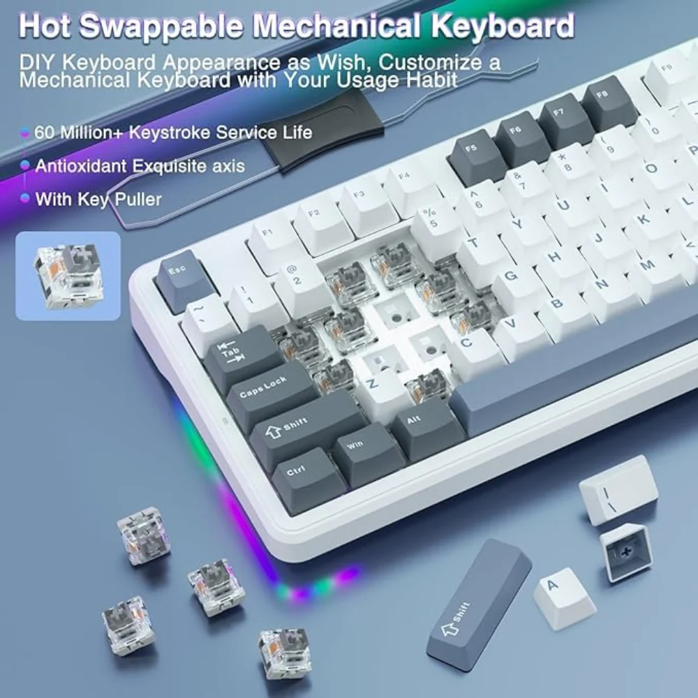 Aula-f87-75-wireless-mechanical-gaming-keyboard-smoke-blue-graywood-switch-f87uw-03 Promotional image of a white hot-swappable mechanical keyboard with exposed switches and rgb underglow; on-screen text reads 'hot swappable mechanical keyboard' and lists features: '60 million+ keystroke service life', 'antioxidant exquisite axis', 'with key puller'
