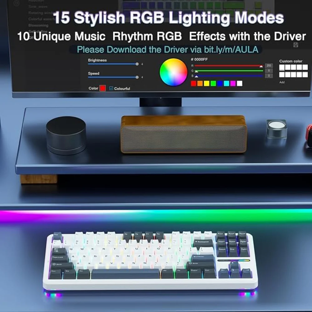 Aula-f87-75-wireless-mechanical-gaming-keyboard-smoke-blue-graywood-switch-f87uw-04 Desk setup with rgb keyboard and ambient underglow lighting, monitor showing a color mixer app nearby.