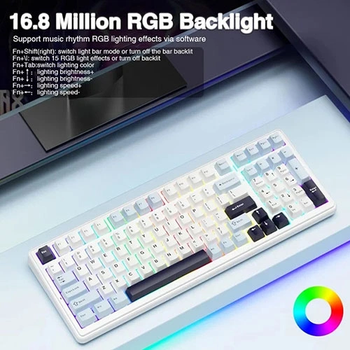 Aula-f99-tri-mode-rgb-mechanical-gaming-ice-blue-keyboard-with-reaper-switches-06 White rgb-backlit keyboard on a light surface with a color wheel icon in the corner, highlighting 16. 8 million color options shown by on-screen text.