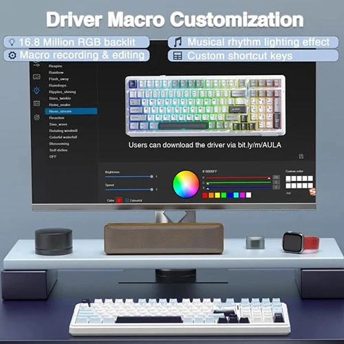 Aula-f99-tri-mode-rgb-mechanical-gaming-ice-blue-keyboard-with-reaper-switches-07 Monitor displays a macro customization ui with color wheel and sliders; caption reads 'driver macro customization' with tips bubbles around the screen; keyboard on desk below.